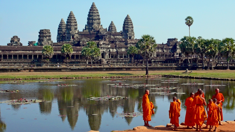 Monks in front of Angkor Wat