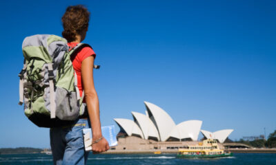 Backpacker in front of the Sydney opera house