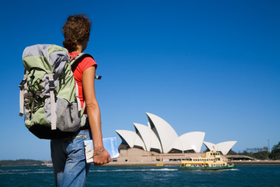 Backpacker in front of the Sydney opera house