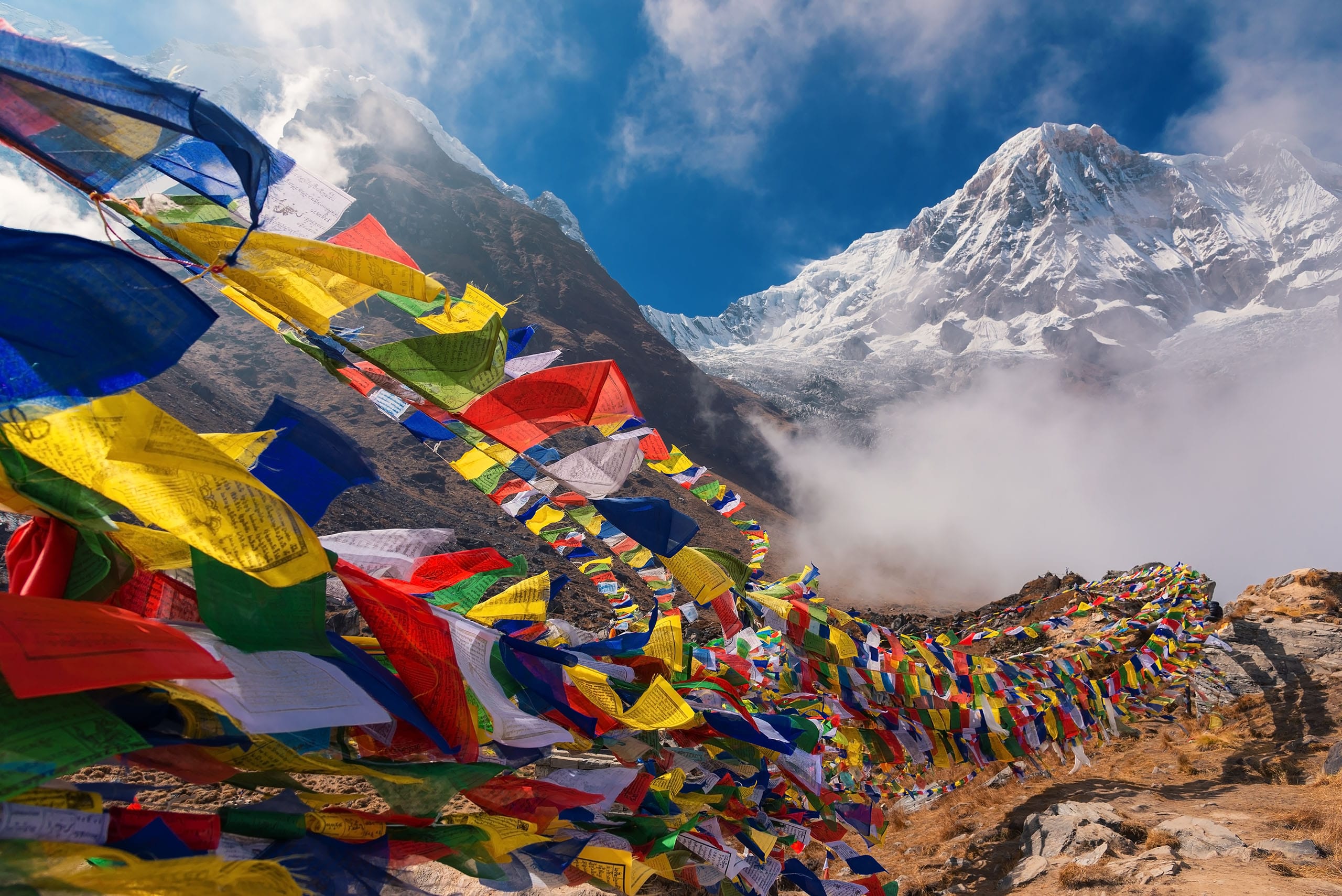 Nepal travel mountains with Buddist flags